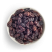 Raisins in white bowl freestanding
