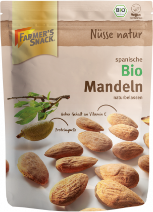 Zwolnione opakowanie hiszpańskich migdałów organicznych naturalnych z pieczęcią ekologiczną i etykietą wegańską