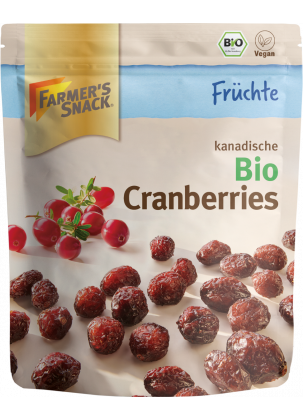 Opakowanie suszonej organicznej żurawiny 100 g z logo Farmer's Snack, pieczęcią ekologiczną i etykietą wegańską
