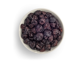 Dried cherries in white bowl freestanding