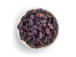 Raisins in white bowl freestanding