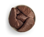 Chocolate mango milk chocolate in white bowl
