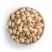Pistachos tostados y salados en un bol blanco