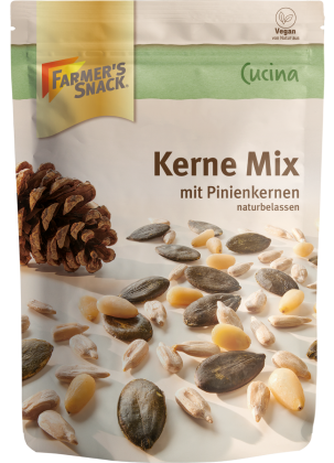 Freestanding packaging for Cucina seed mix consisting of sunflower seeds, pumpkin seeds and pine nuts, 150 g, with Farmer's Snack logo and vegan label.